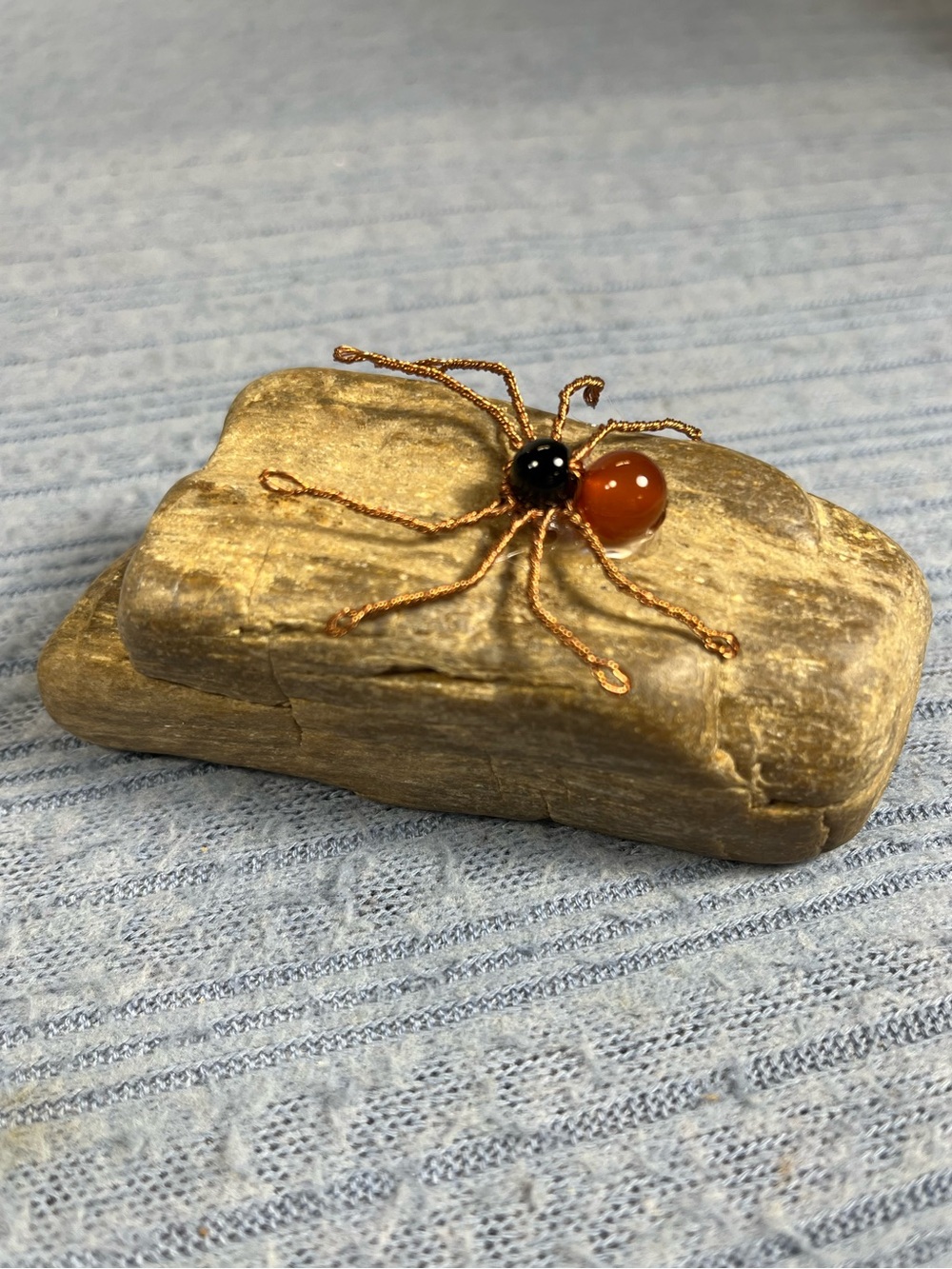 Gemstone Carnelian and Obsidian Spider on Arizona Petrified Wood